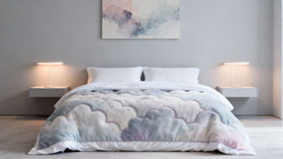 A clean, minimalist bedroom setting featuring Dreamey CloudThera bedding, emphasizing skin health and a calm sleep environment.