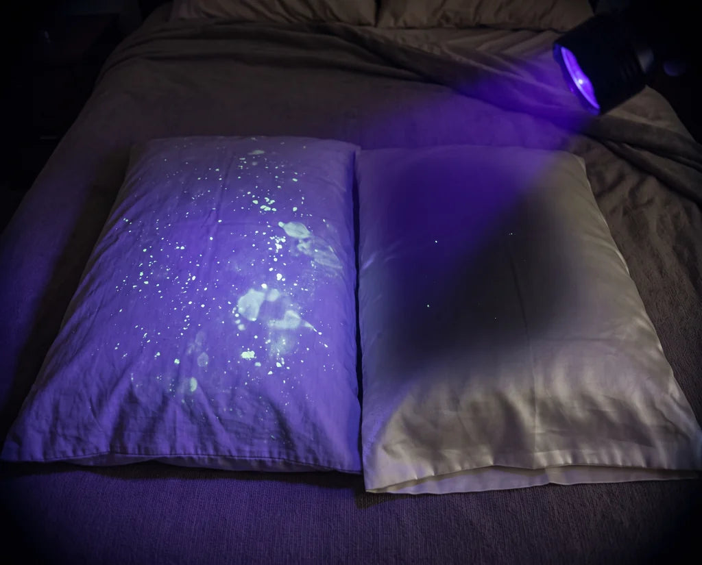 UV light residue test comparing cotton and CloudThera pillowcase fabric